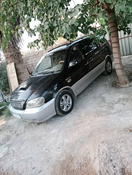 كيا كرنفال 2004 - صورة 4