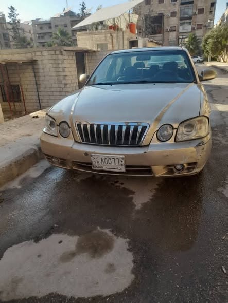 كيا اوبتيما 2002 - صورة 1