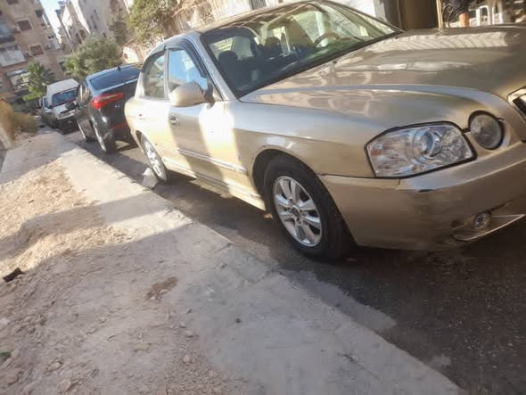 كيا اوبتيما 2002 - صورة 2