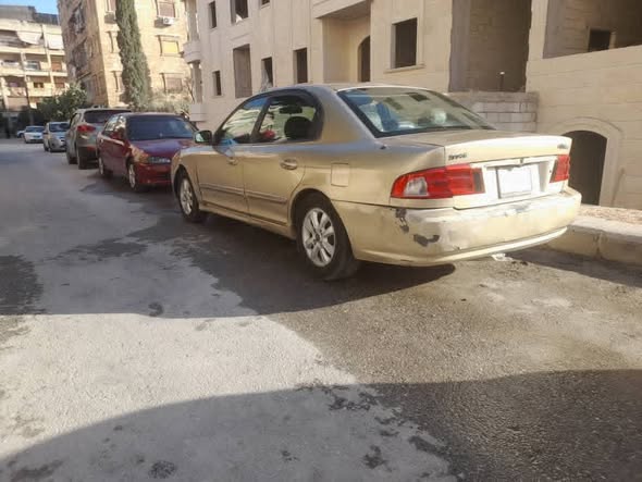 كيا اوبتيما 2002 - صورة 4