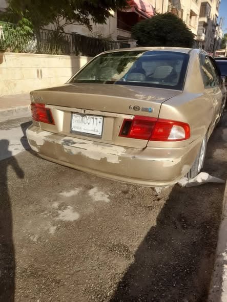 كيا اوبتيما 2002 - صورة 5