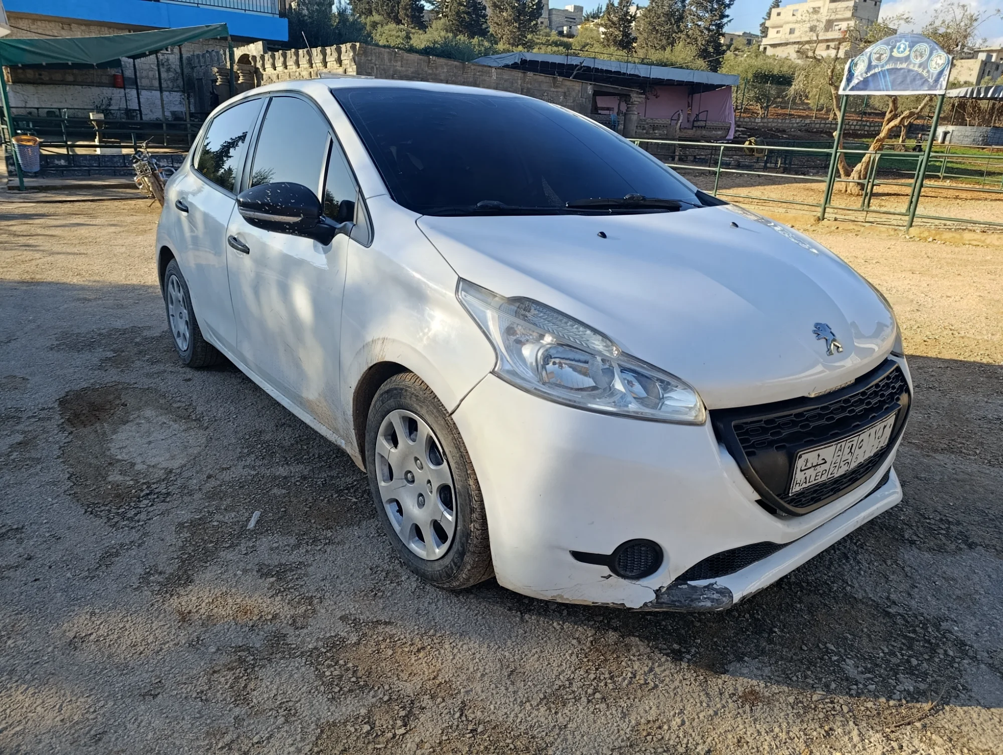 بيجو 208 عادي 2013 بحالة ممتازة واقتصادية - صورة 11