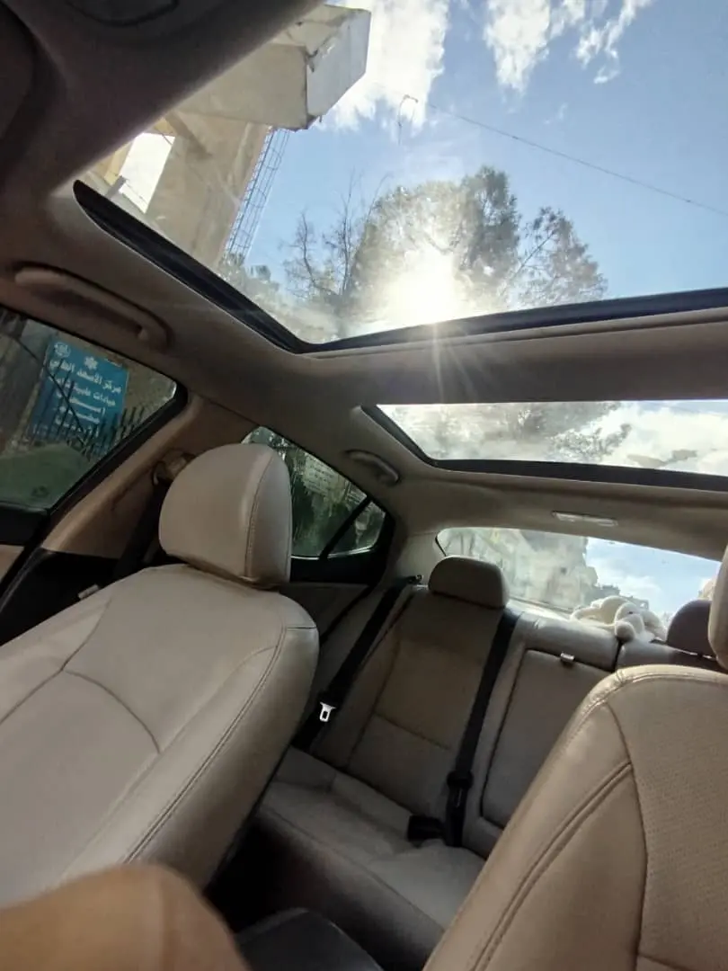 كيا أوبتيما 2012 بحالة ممتازة وفتحة سقف بانورامية - صورة 7