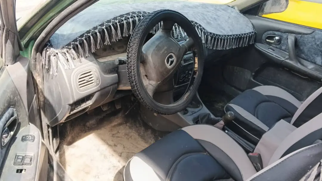 مازدا 2002 - سيارة اقتصادية مطلوب 2700 وبازار على ارض الواقع  - صورة 2