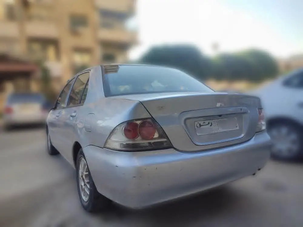 ميتسوبيشي لانسر 2005 بحالة جيدة وإقتصادية  - صورة 6