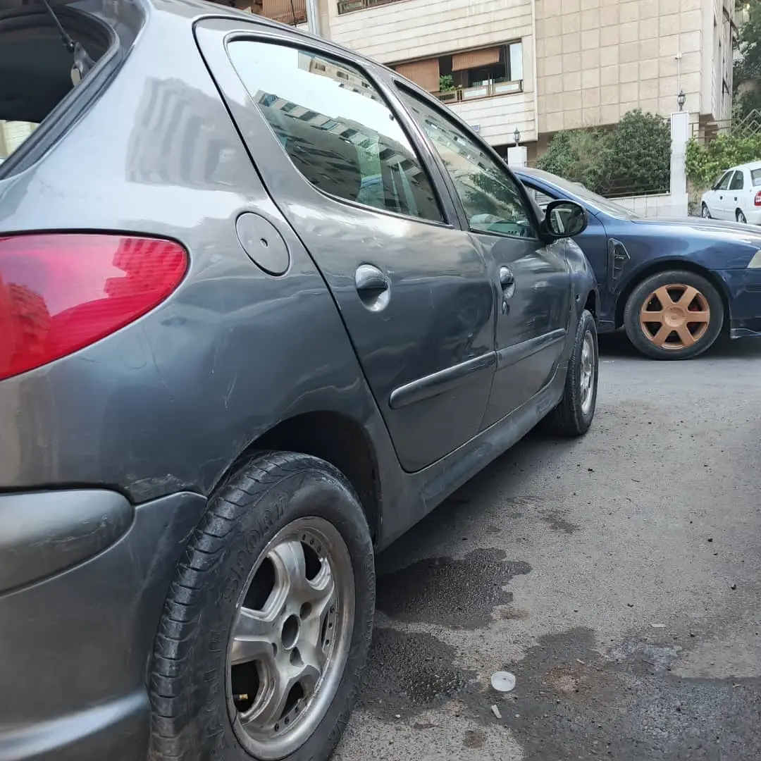 بيجو 206 موديل 2005 - سيارة اقتصادية ومميزة - صورة 9