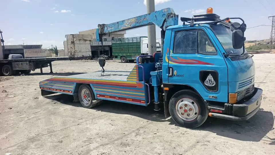 شاحنة إيسوزو NPR موديل 1969 مجهزة برافعة - صورة 2