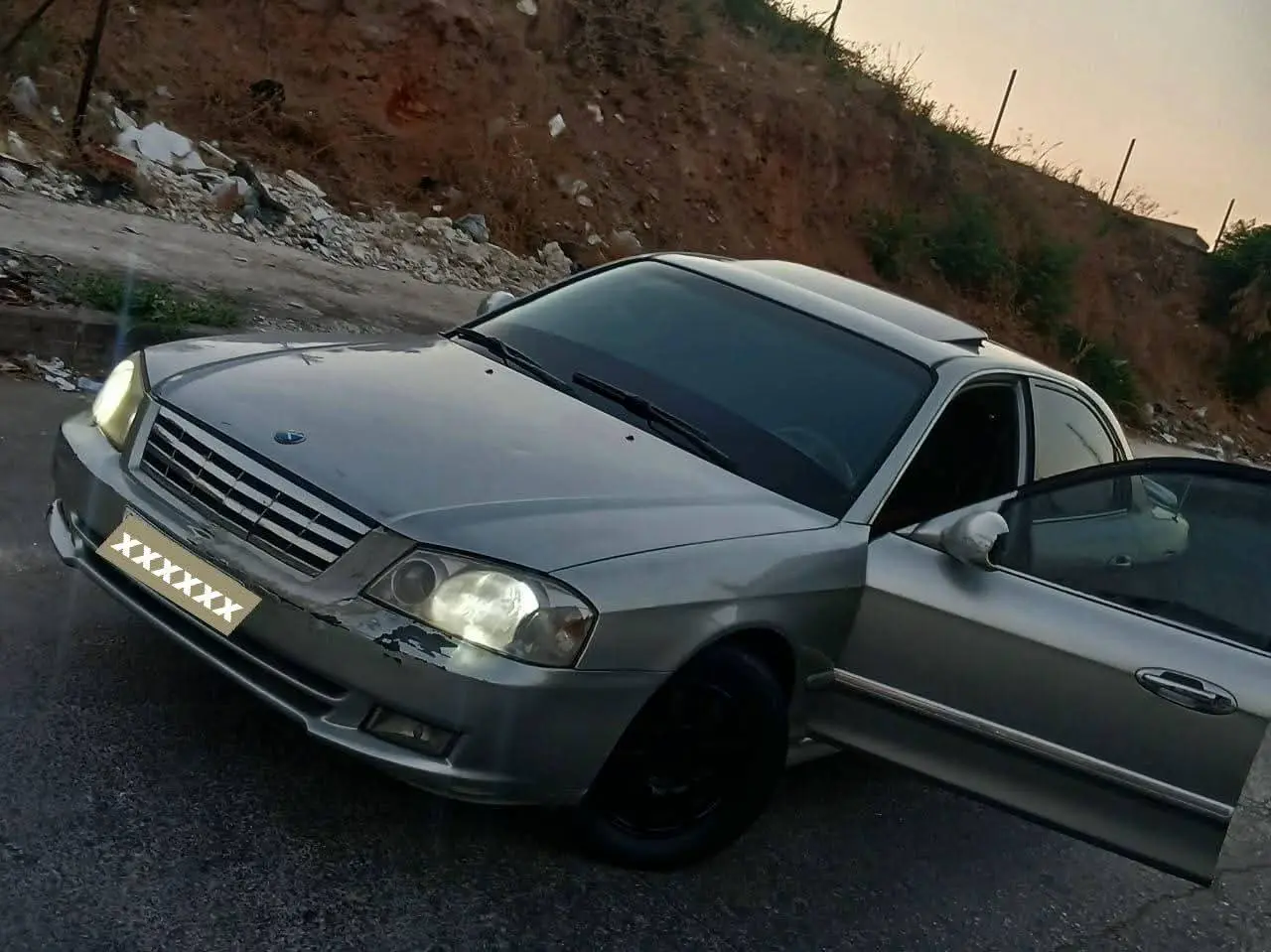 كيا أوبتيما 2003  - صورة 1