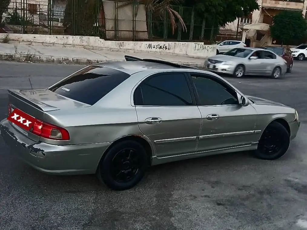 كيا أوبتيما 2003  - صورة 5