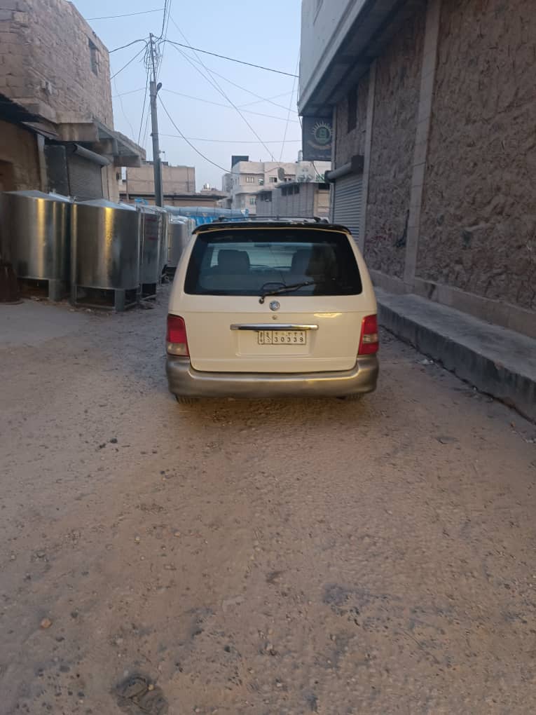 كيا كرنفال ٢٠٠١ مازوط  - صورة 1