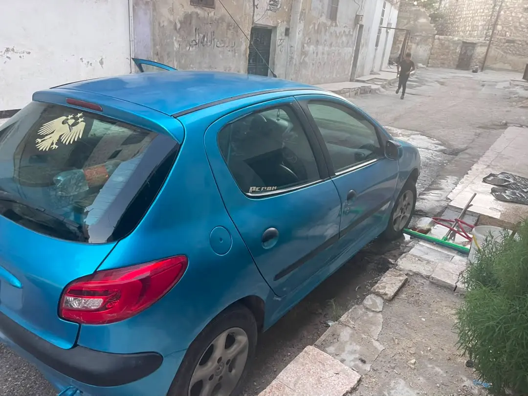 بيجو 206 موديل 2003 بحالة جيدة - صورة 4